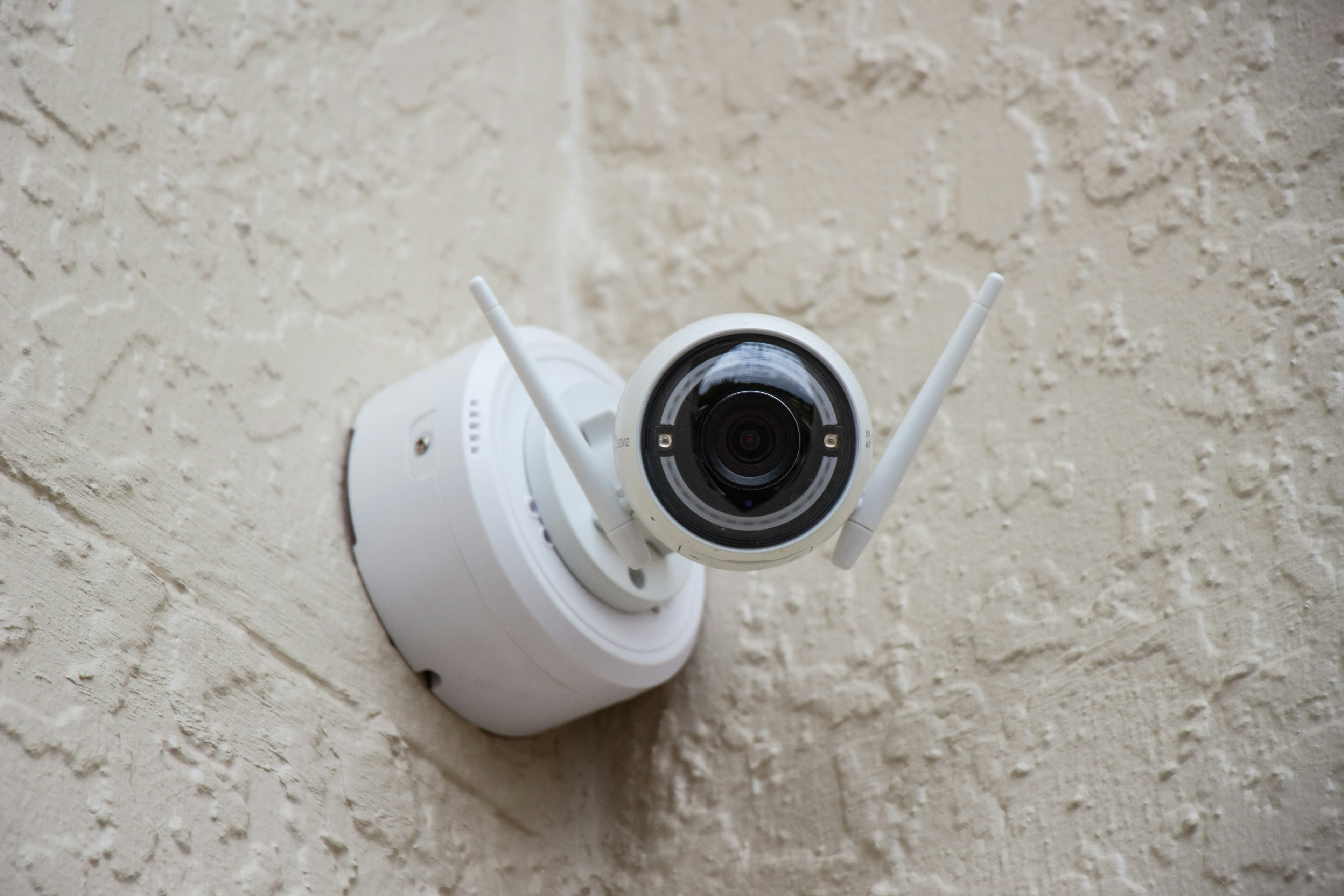 Security camera mounted on wall